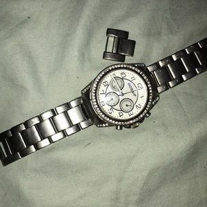 Sliver watch with diamonds